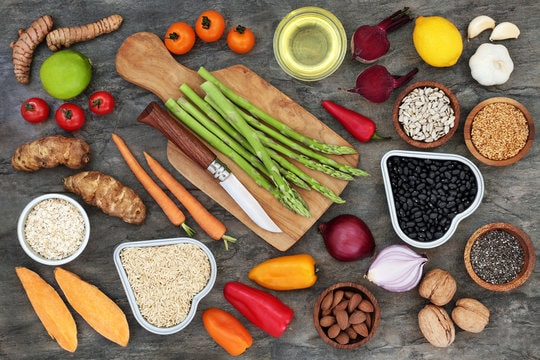 Eat for a Healthy Heart healthy food arrangement on platters and cutting boards