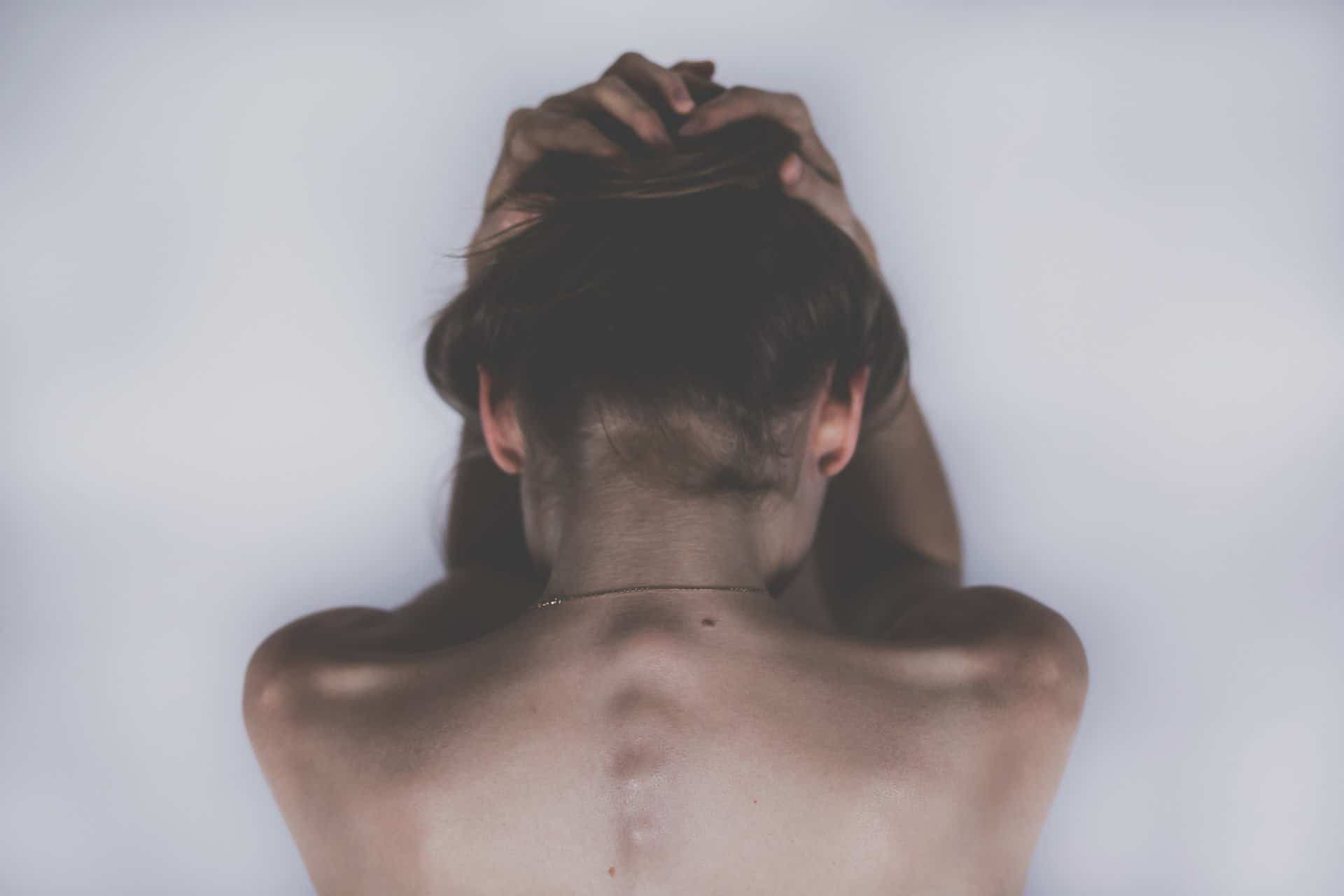 view of a woman's spine - featured image