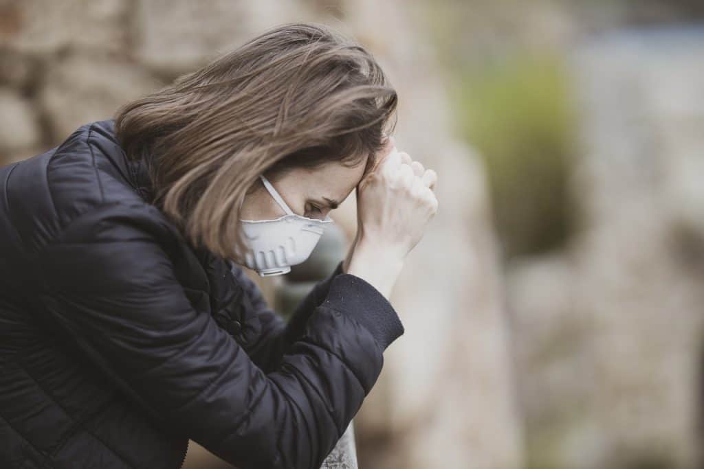 depressed female during pandemic- featured image
