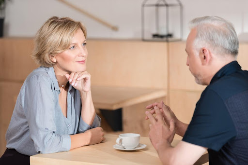 Older couple having a talk - featured image