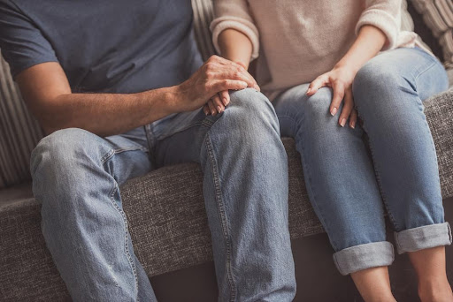 a couple holding hands